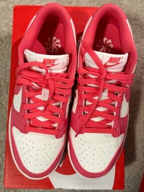 Nike Women’s Low-Top Dunks in Aster Pink and Sail. “Next Nature”